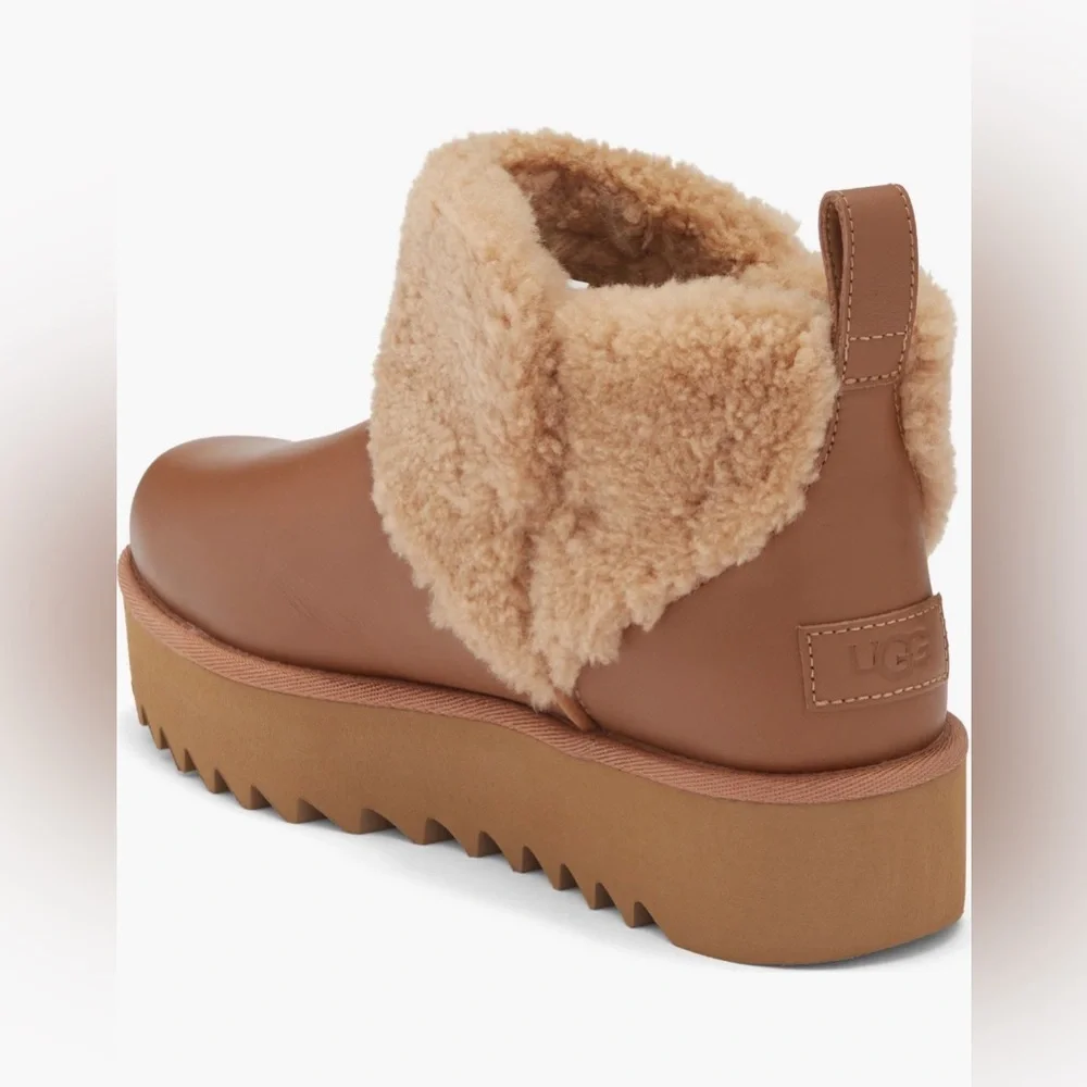 UGG®
Ultra Mini Alina
Curled
Genuine
Shearling
Platform Boot (Women) - Picture 2 of 6